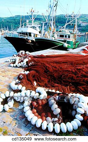 Fishing nets and boats. Getaria. Basque Country. Spain View Large Photo Image Stock Photo - Fishing nets and boats. Getaria. Basque Country. Spain. Fotosearch