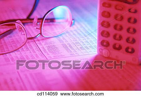 Glasses, telephone, financial page View Large Photo Image Stock Photo - Glasses, telephone, financial page. Fotosearch