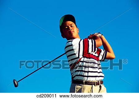 Golfer watches his drive View Large Photo Image Stock Image - Golfer watches his drive. Fotosearch