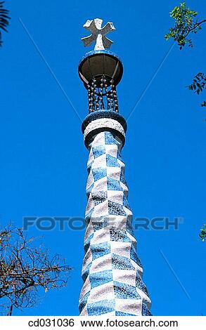 Lantern of one of the pavillions at the G? ell Park (Gaud?, 1900-1914). Barcelona. Spain View Large Photo Image Stock Photograph - Lantern of one of the pavillions at the G? ell Park (Gaud?, 1900-1914). Barcelona. Spain. Fotosearch