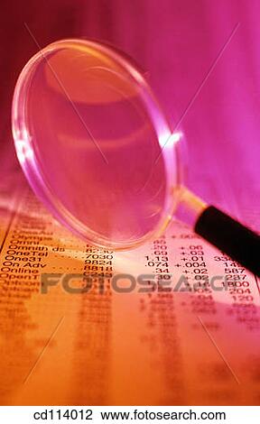 Magnifying glass on financial page View Large Photo Image Stock Image - Magnifying glass on financial page. Fotosearch