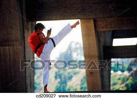Man practices karate View Large Photo Image Stock Photo - Man practices karate. Fotosearch