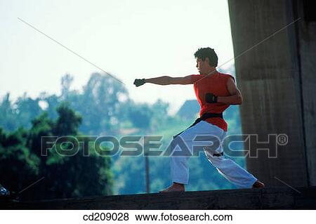 Man practices karate View Large Photo Image Stock Photo - Man practices karate. Fotosearch
