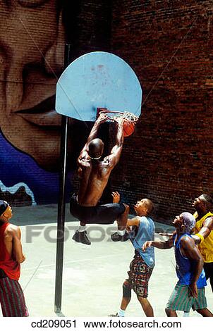 Men playing street basketball View Large Photo Image Stock Image - Men playing street basketball. Fotosearch