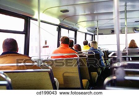 Passengers on bus View Large Photo Image Stock Image - Passengers on bus. Fotosearch