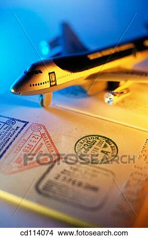 Passport and airplane View Large Photo Image Picture - Passport and airplane. Fotosearch