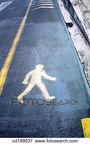Stock Photo - Pedestrian sign on road. Fotosearch