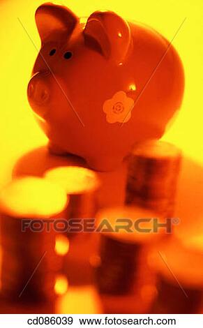 Piggy bank and coins View Large Photo Image Stock Photo - Piggy bank and coins. Fotosearch
