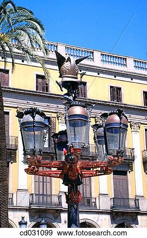 Stock Photo - Street lamps at Plaza Real, whose design was inspired by Gaud??s models (c. 1878). Barcelona. Spain. Fotosearch