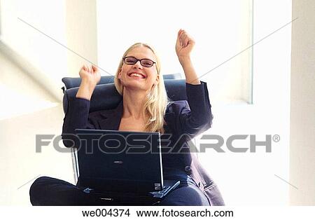 Successful businesswoman rejoices View Large Photo Image Picture - Successful businesswoman rejoices. Fotosearch
