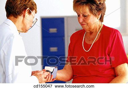 Testing blood pressure View Large Photo Image Stock Photo - Testing blood pressure. Fotosearch