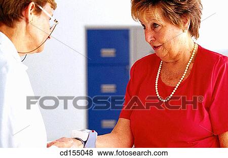 Testing blood pressure View Large Photo Image Stock Photo - Testing blood pressure. Fotosearch