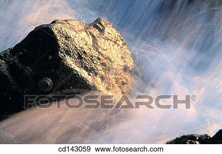 Wave hitting rocks along coastline. La Jolla. California. USA View Large Photo Image Stock Photo - Wave hitting rocks along coastline. La Jolla. California. USA. Fotosearch