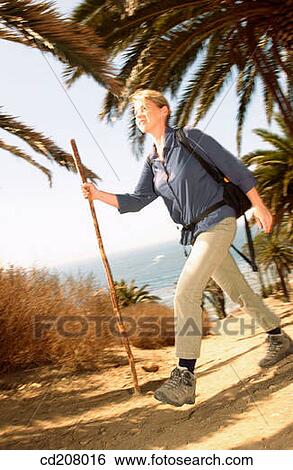 Woman hiking View Large Photo Image Stock Photograph - Woman hiking. Fotosearch