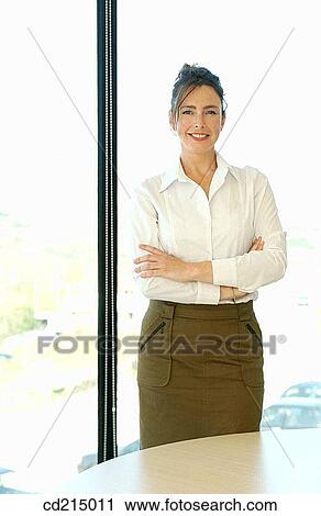 Stock Image - 30's, business, arms folded, Arms crossed, 20's. Fotosearch