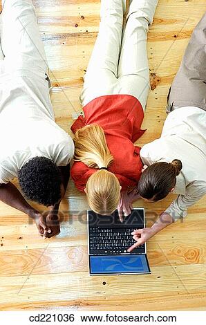 Stock Photograph - 30's, business, black, African-American, 20's. Fotosearch