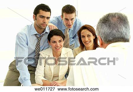 Stock Photo - 30's, business, brunette, boss, 20's. Fotosearch