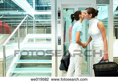 Stock Image - 30's, businesspeople, business, briefcase, 20's. Fotosearch