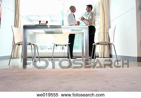 Stock Photography - 30's, businesspeople, businessman, business, 20's. Fotosearch