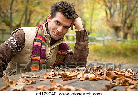 Stock Image - 30's, calm, black hair, autumn, 20's. Fotosearch