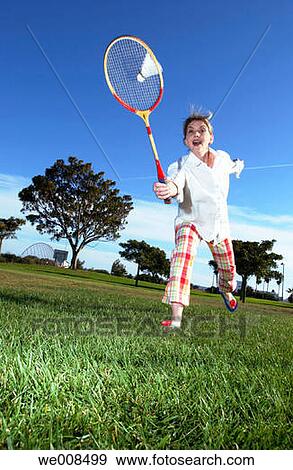A woman badminton player View Large Photo Image Stock Photo - A woman badminton player. Fotosearch