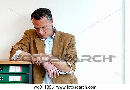 Stock Photography - absent-mindedness, businessman, business, absorbed, Absent-minded. Fotosearch