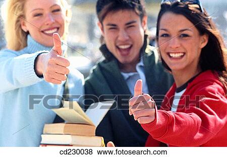 Stock Photo - achievement, blond, black hair, approval, 20's. Fotosearch