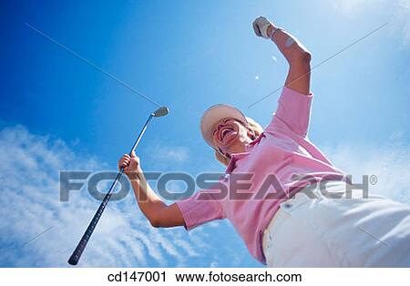 Stock Image - achievement, celebrate, Arms raised, 30's. Fotosearch