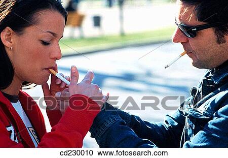Stock Image - addiction, black hair, Bad habit, adolescence, 20. Fotosearch