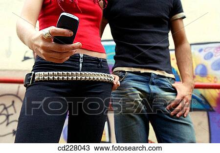 Stock Image - adolescence, background, anonymous, amusement, 20's. Fotosearch