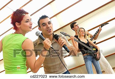 adolescence, Bass guitar, band, 20's View Large Photo Image Stock Image - adolescence, Bass guitar, band, 20's. Fotosearch