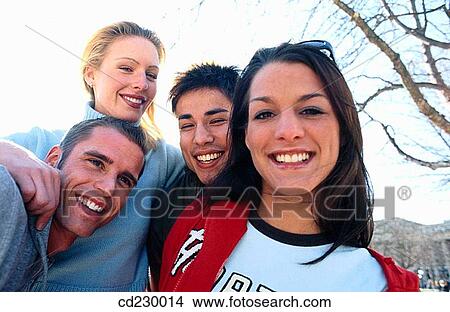 Picture - adolescence, blond, black hair, 20's. Fotosearch