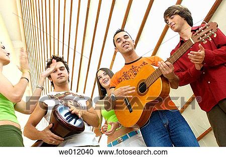 Stock Image - adolescence, boy, amusement, 20's. Fotosearch