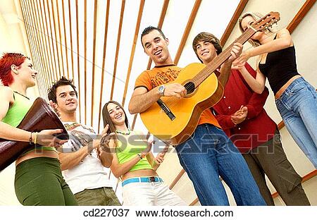 Stock Photo - adolescence, boy, amusement, 20's. Fotosearch