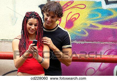 Stock Image - adolescence, boy, background, amusement, 20's. Fotosearch