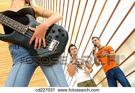 adolescence, boy, Bass guitar, band, 20's View Large Photo Image Stock Image - adolescence, boy, Bass guitar, band, 20's. Fotosearch
