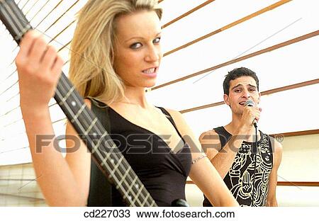 adolescence, boy, Bass guitar, band, 20's View Large Photo Image Stock Image - adolescence, boy, Bass guitar, band, 20's. Fotosearch