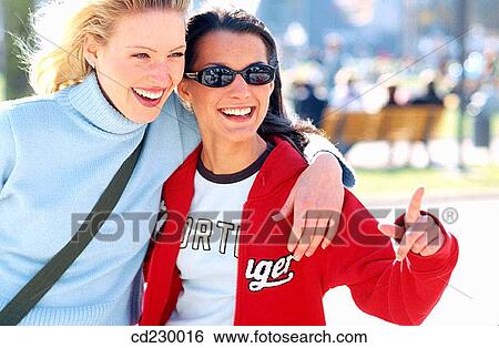 Stock Photograph - adolescence, brunette, blond, 20's. Fotosearch