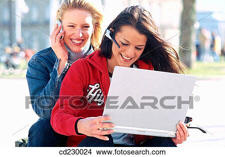 adolescence, brunette, blond, Apple macintosh, 20's View Large Photo Image Picture - adolescence, brunette, blond, Apple macintosh, 20's. Fotosearch