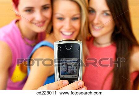 adolescence, camera, brunette, blond, 20's View Large Photo Image Stock Image - adolescence, camera, brunette, blond, 20's. Fotosearch