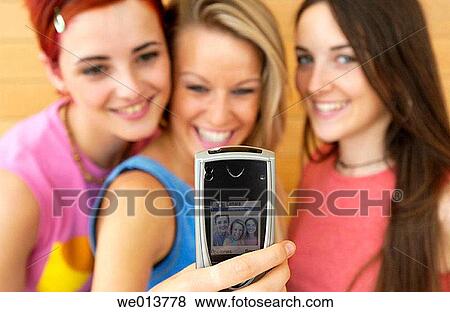 adolescence, camera, brunette, blond, 20's View Large Photo Image Stock Photo - adolescence, camera, brunette, blond, 20's. Fotosearch