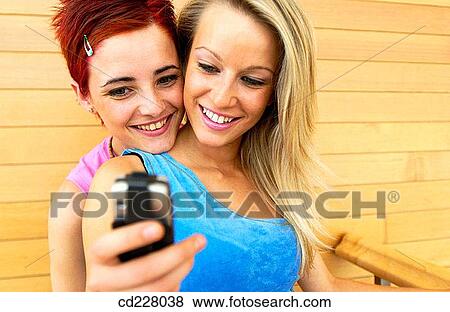 adolescence, cell phone, amusement, 20's View Large Photo Image Stock Photo - adolescence, cell phone, amusement, 20's. Fotosearch