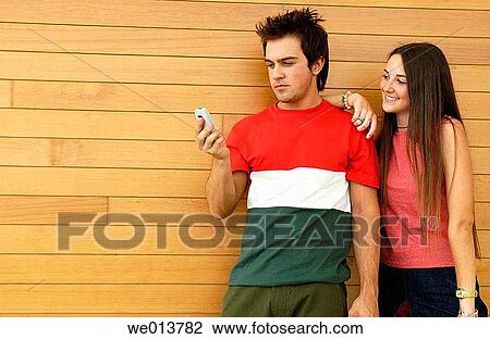 adolescence, cell phone, boy, 20's View Large Photo Image Stock Image - adolescence, cell phone, boy, 20's. Fotosearch