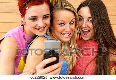 adolescence, cell phone, camera, 20's View Large Photo Image Stock Photography - adolescence, cell phone, camera, 20's. Fotosearch