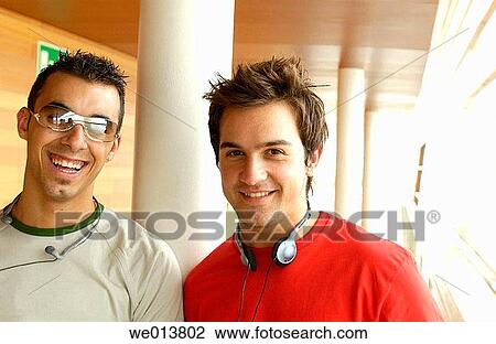 Stock Image - adolescence, colleague, boy, 20's. Fotosearch
