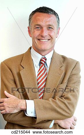 arms folded, businessman, business, blue eyes, Arms crossed View Large Photo Image Picture - arms folded, businessman, business, blue eyes, Arms crossed. Fotosearch