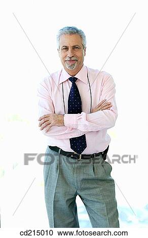Stock Image - arms folded, businesspeople, businessman, business, Arms crossed. Fotosearch