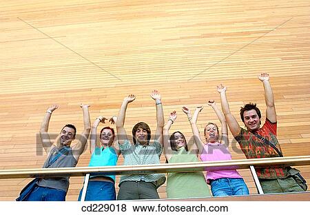 Stock Photo - Arms raised, boy, adolescence. Fotosearch