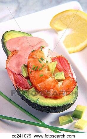 Avocados with shrimps View Large Photo Image Stock Photo - Avocados with shrimps. Fotosearch