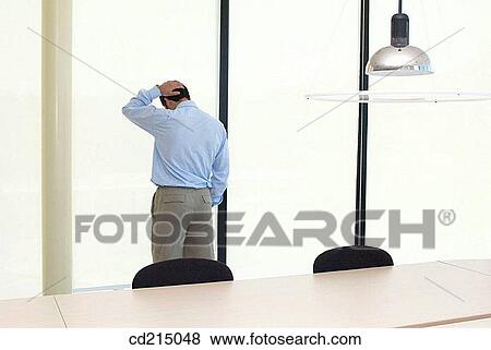 Stock Photo - back view, business, businessman, businesspeople, chair. Fotosearch
